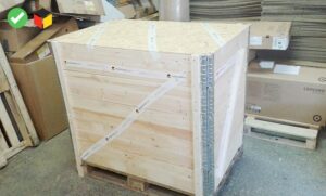 fully assembled wooden crate sealed and strapped for shipment